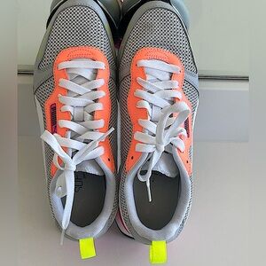 Puma, Men’s size 10, USED CONDITION. Multi colored grey base.